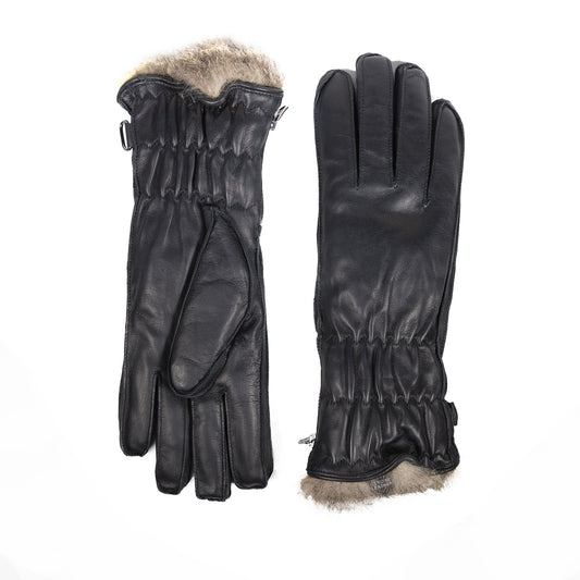 Women's black leather ski gloves featuring a plush fur lining and elasticized cuffs for warmth and style.