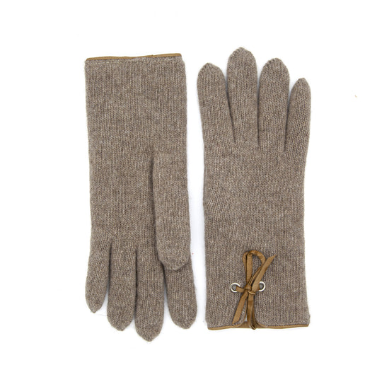 Women's cashmere gloves in soft taupe, featuring a stylish leather trim and elegant bow detail for a refined touch.