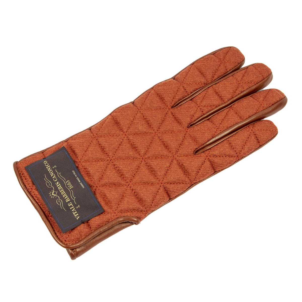 Quilted camel color fabric and nappa leather glove showcasing Italian craftsmanship and elegant design details.