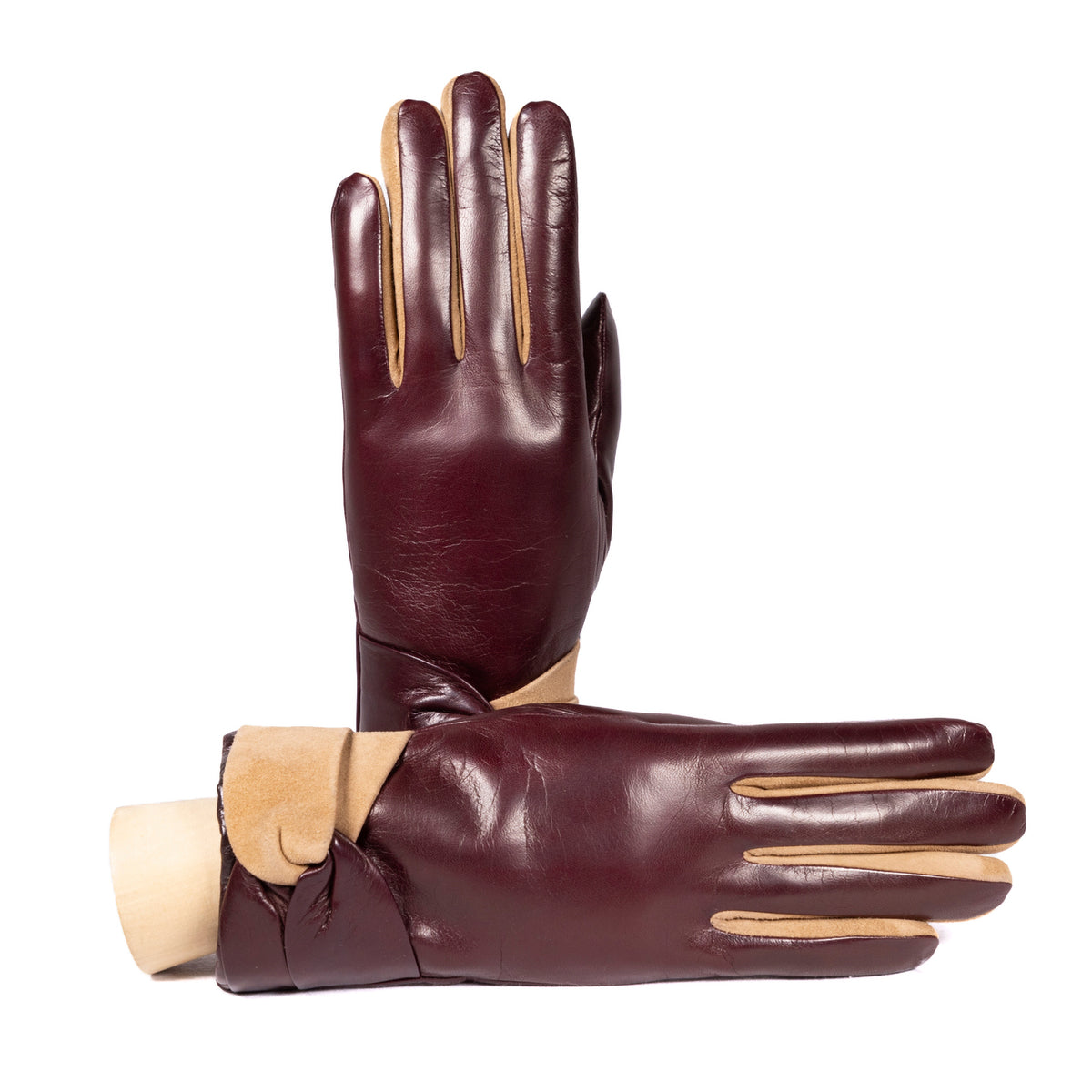 Ladies' burgundy nappa leather gloves with suede accents and a soft cashmere lining, showcasing elegant Italian craftsmanship.