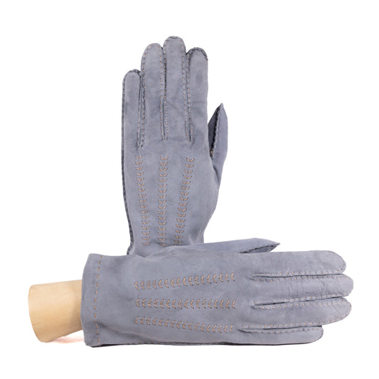 Light gray suede leather gloves, hand-sewn with intricate stitching, featuring a soft cashmere lining for added luxury.