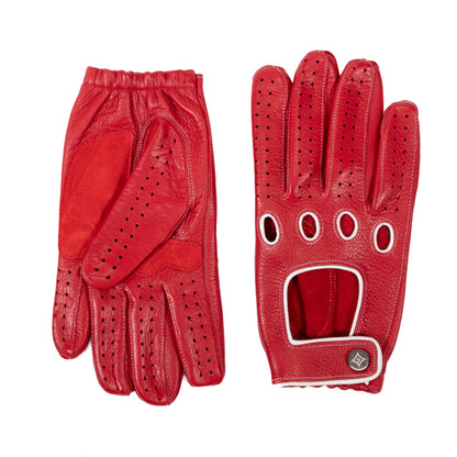 Red deerskin driving gloves with snap closure, featuring perforated detailing and contrast color accents for a stylish touch.