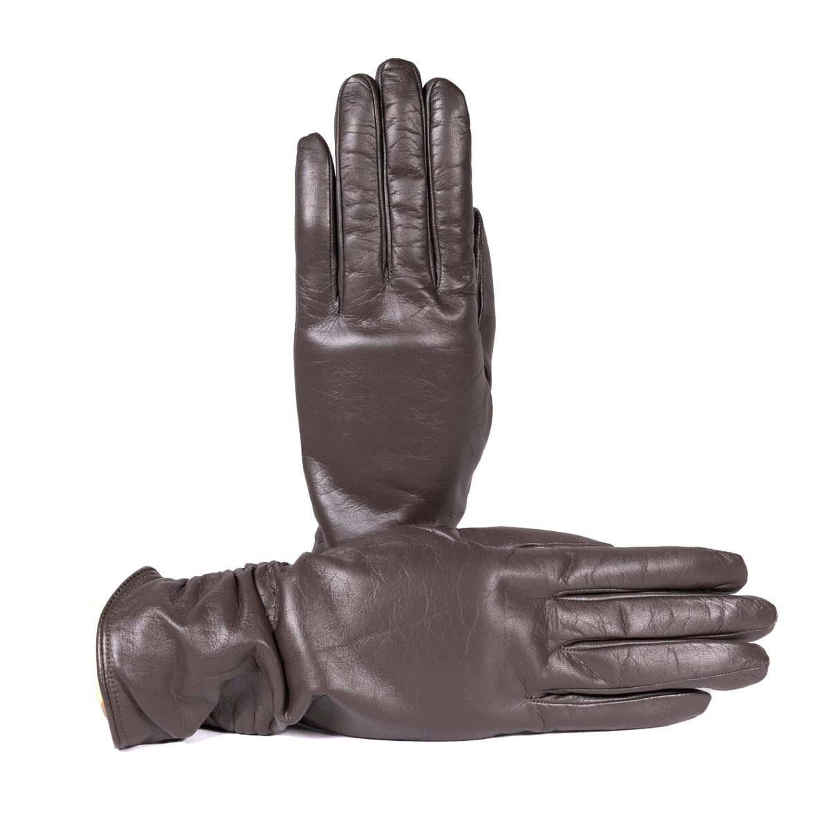Ladies' brown leather touchscreen gloves, cashmere lined, showcasing soft texture and elegant design for luxury winter wear.
