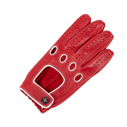 Red deerskin driving glove featuring perforations and a snap closure, accented with contrasting white details for a stylish look.