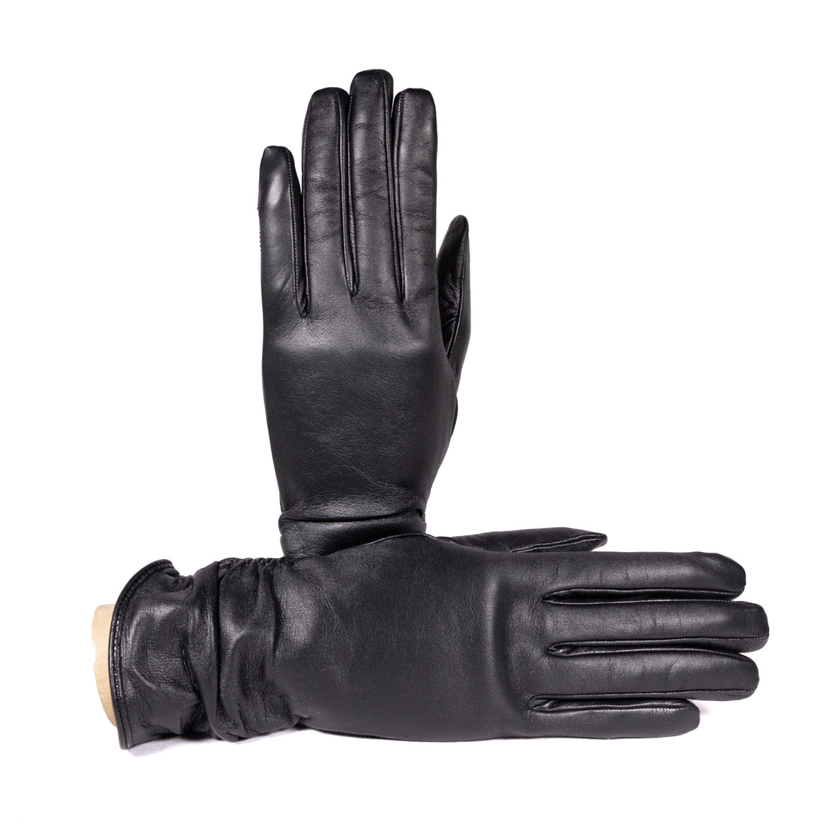 Black leather ladies' touchscreen gloves, elegantly lined with cashmere for added warmth and comfort.