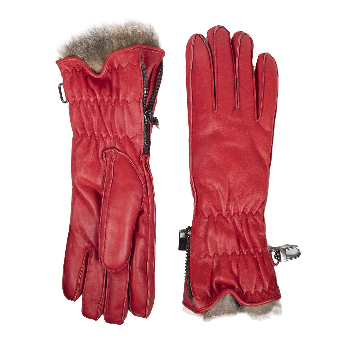 Red leather women's ski gloves featuring a plush fur lining and zippered cuffs for a snug, stylish fit.