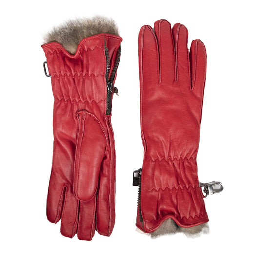 Red leather women's ski gloves featuring a plush fur lining and zippered cuffs for a snug, stylish fit.