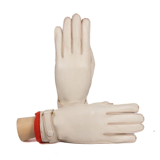 Ladies' deerskin leather gloves in cream with vibrant cashmere lining, showcasing elegant Italian craftsmanship and design.