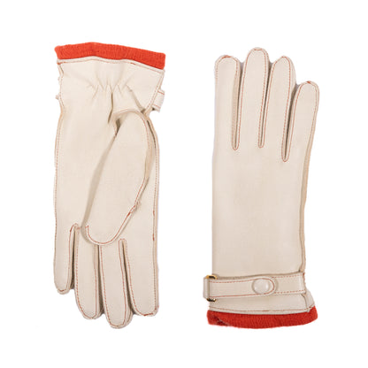 Ladies' deerskin leather gloves with vibrant orange cashmere lining, showcasing elegant Italian craftsmanship and refined design.