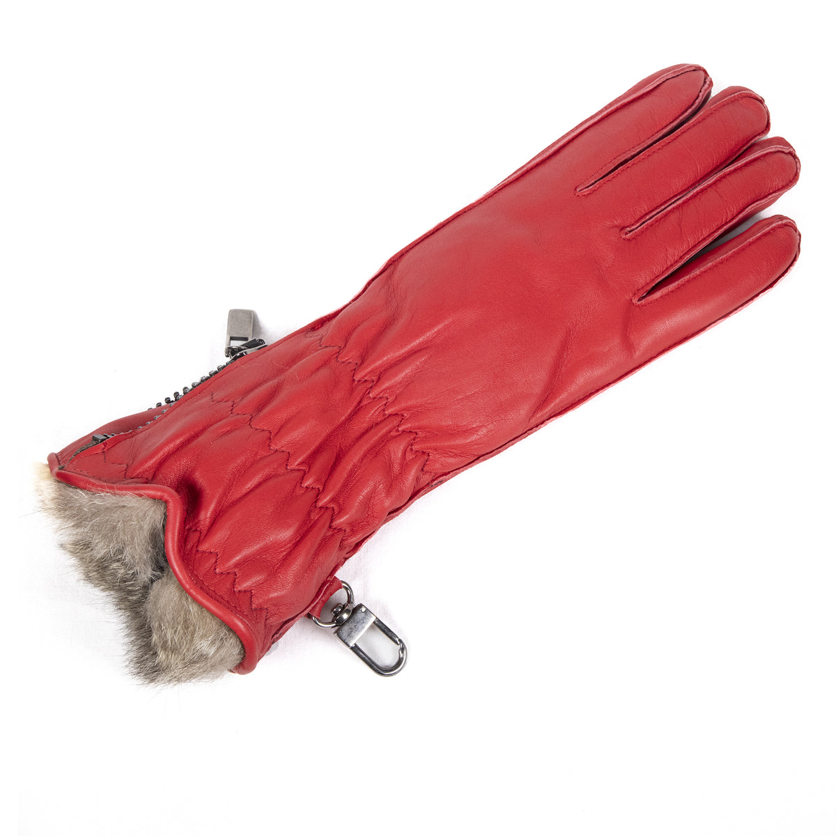 Red leather women's ski gloves featuring a plush fur lining and stylish zip closure for warmth and elegance.