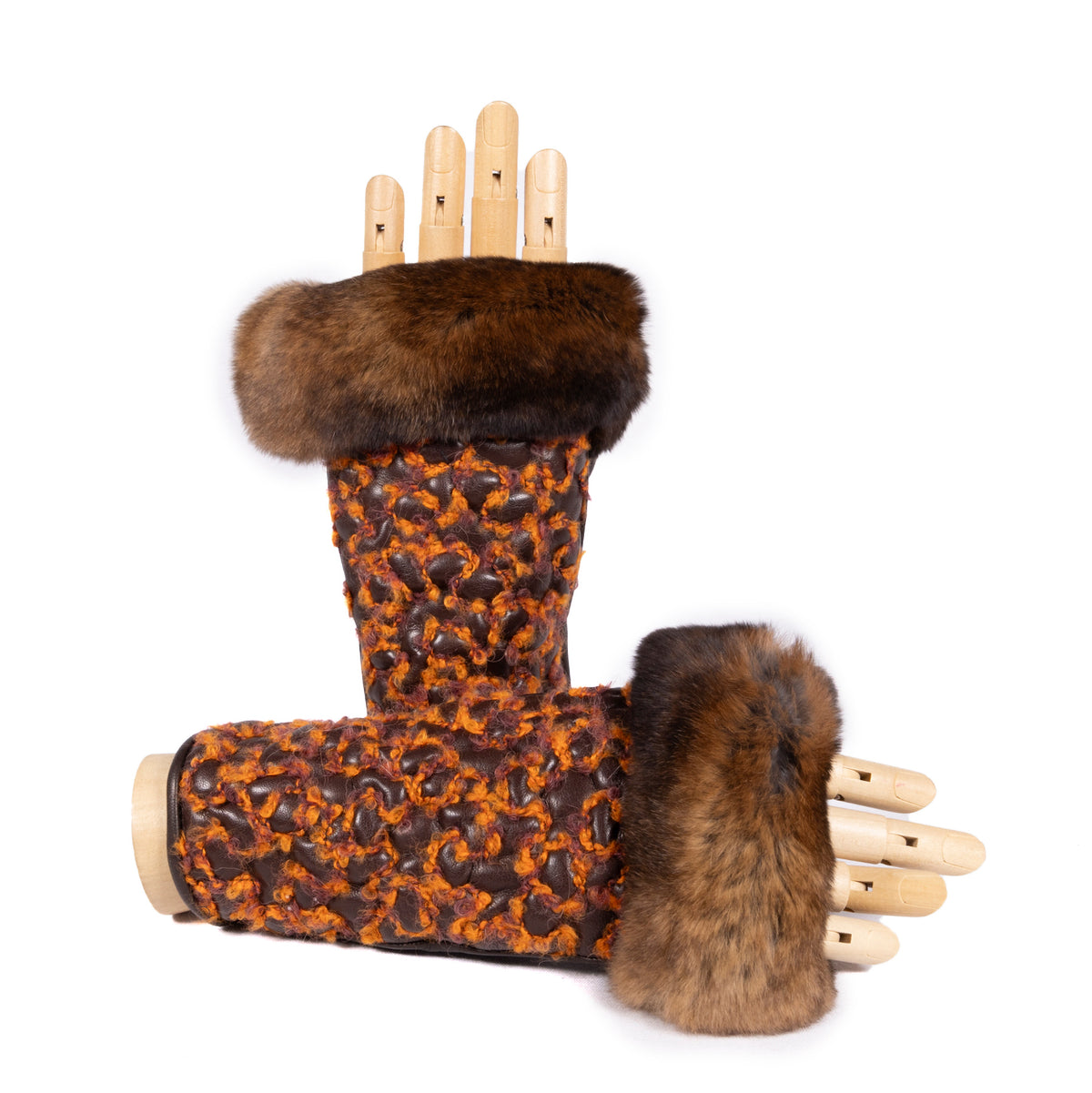 Ladies' fingerless nappa leather gloves featuring a textured brown design with luxurious fur cuffs in rich tones.
