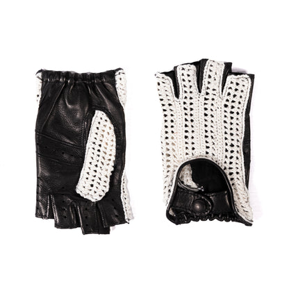 Black leather driving gloves featuring a White crochet top, showcasing a blend of elegance and Italian craftsmanship.