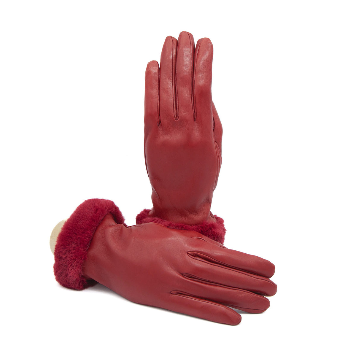 Women's red nappa leather gloves with plush faux fur cuffs, showcasing elegant Italian craftsmanship and luxurious design.
