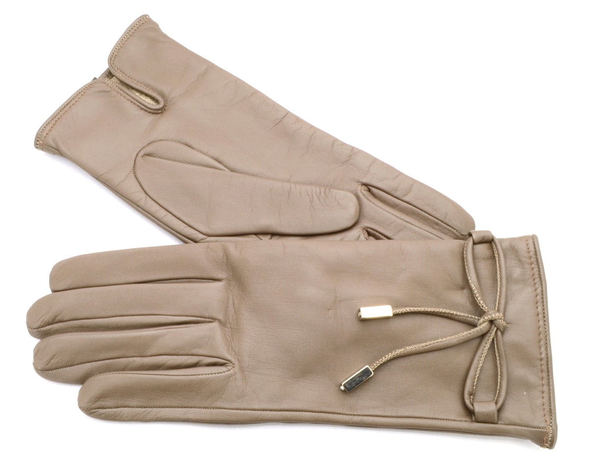 Women's nappa leather gloves in soft beige, featuring a stylish leather bow and elegant detailing for a refined look.