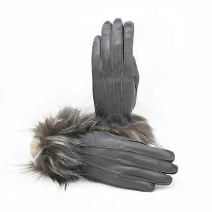 Gray leather gloves featuring a luxurious faux fur cuff, showcasing elegant Italian design and craftsmanship.
