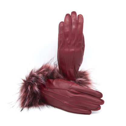 Burgundy leather gloves featuring a soft faux fur cuff, showcasing elegant Italian craftsmanship and luxurious design.