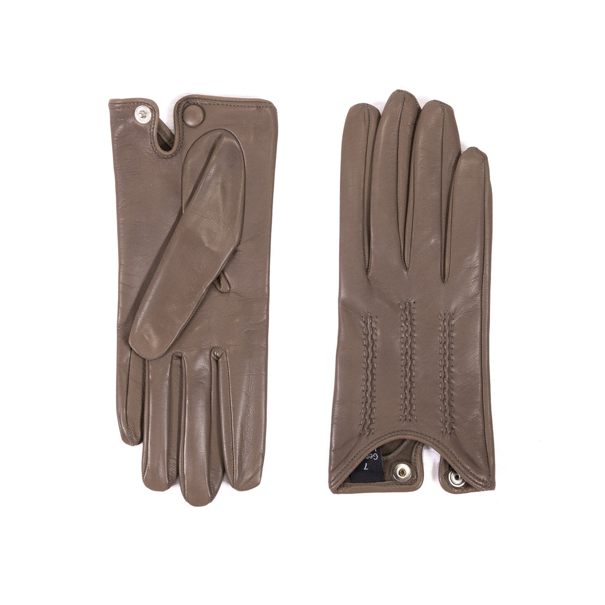 Women's unlined spring gloves in soft taupe leather, showcasing elegant stitching and a refined design for sophisticated style.