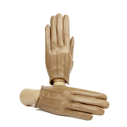 Women's unlined spring gloves in soft beige leather, showcasing elegant stitching and refined Italian craftsmanship.