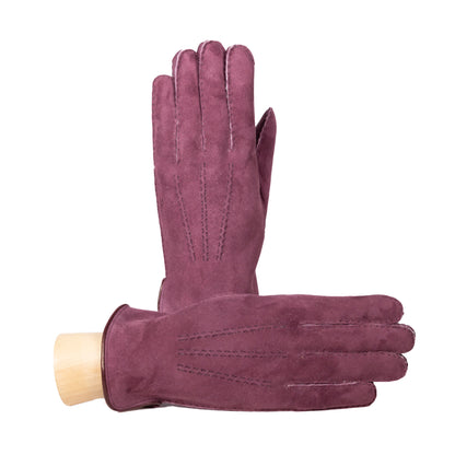 Men's burgundy curly lambskin gloves featuring a leather piped edge and elegant side opening, showcasing Italian craftsmanship.