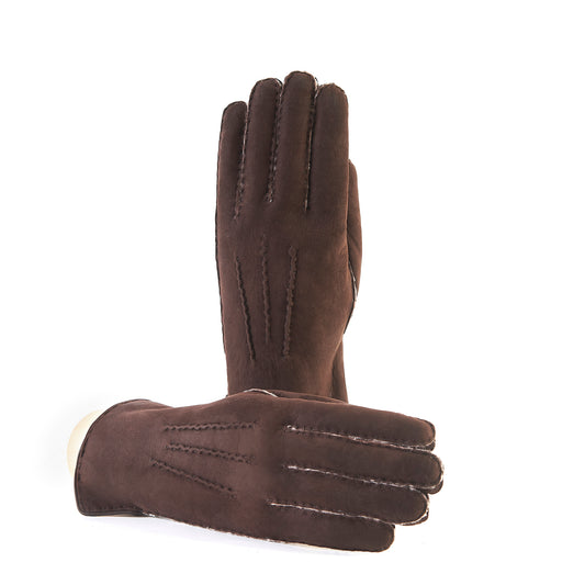 Men's brown curly lambskin gloves featuring a leather piped edge and elegant side opening, showcasing Italian craftsmanship.