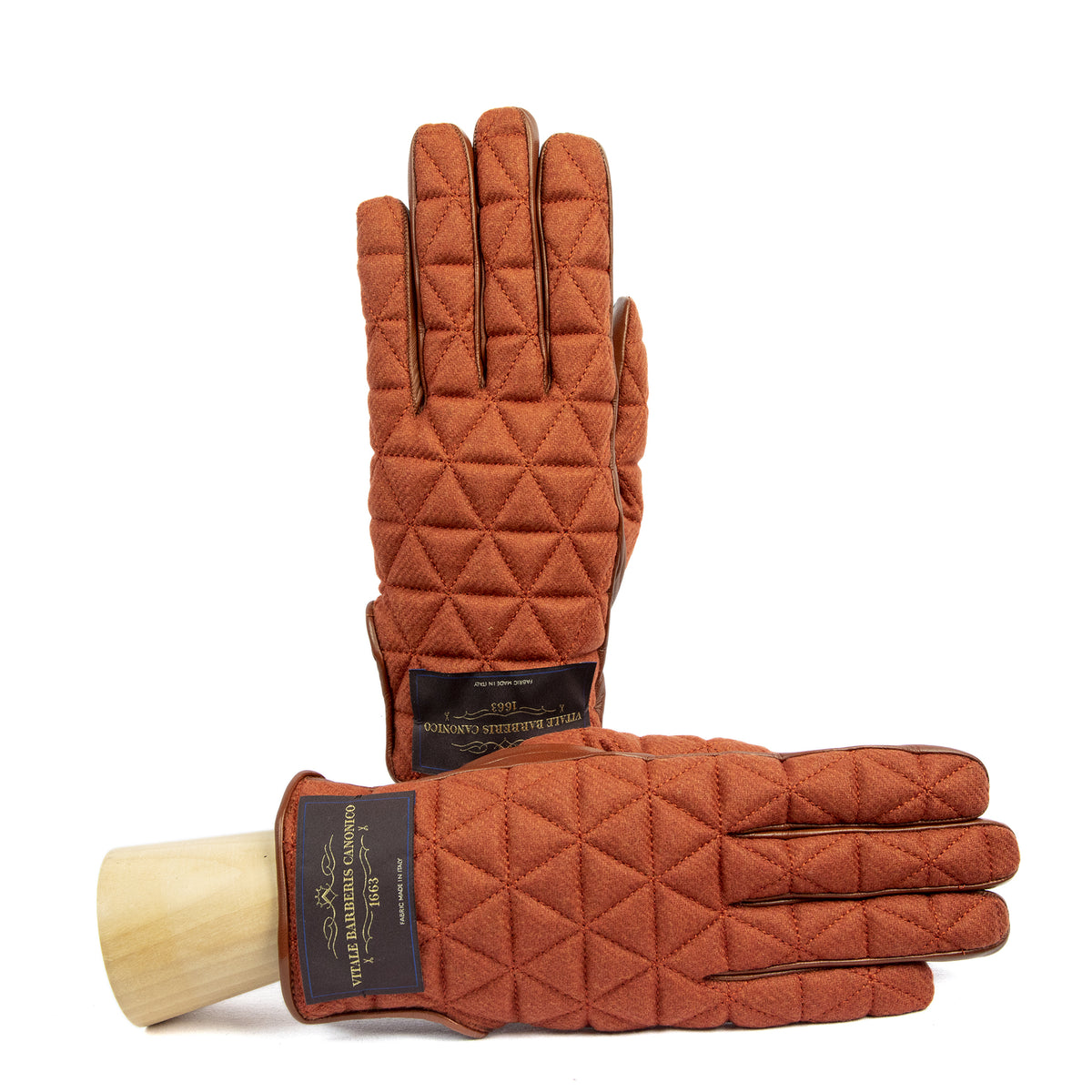 Quilted camel color fabric gloves with nappa leather accents, showcasing Italian craftsmanship and elegant design.