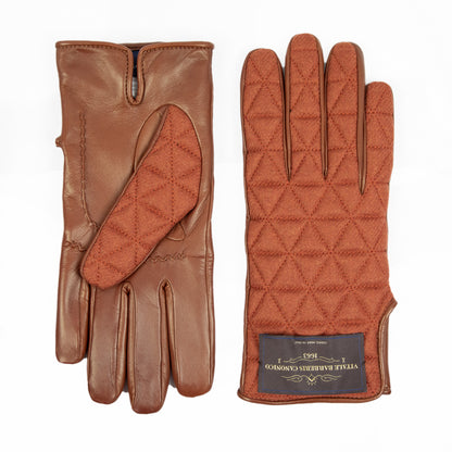 Quilted fabric and nappa leather gloves in warm cognac, showcasing Italian craftsmanship and elegant design details.