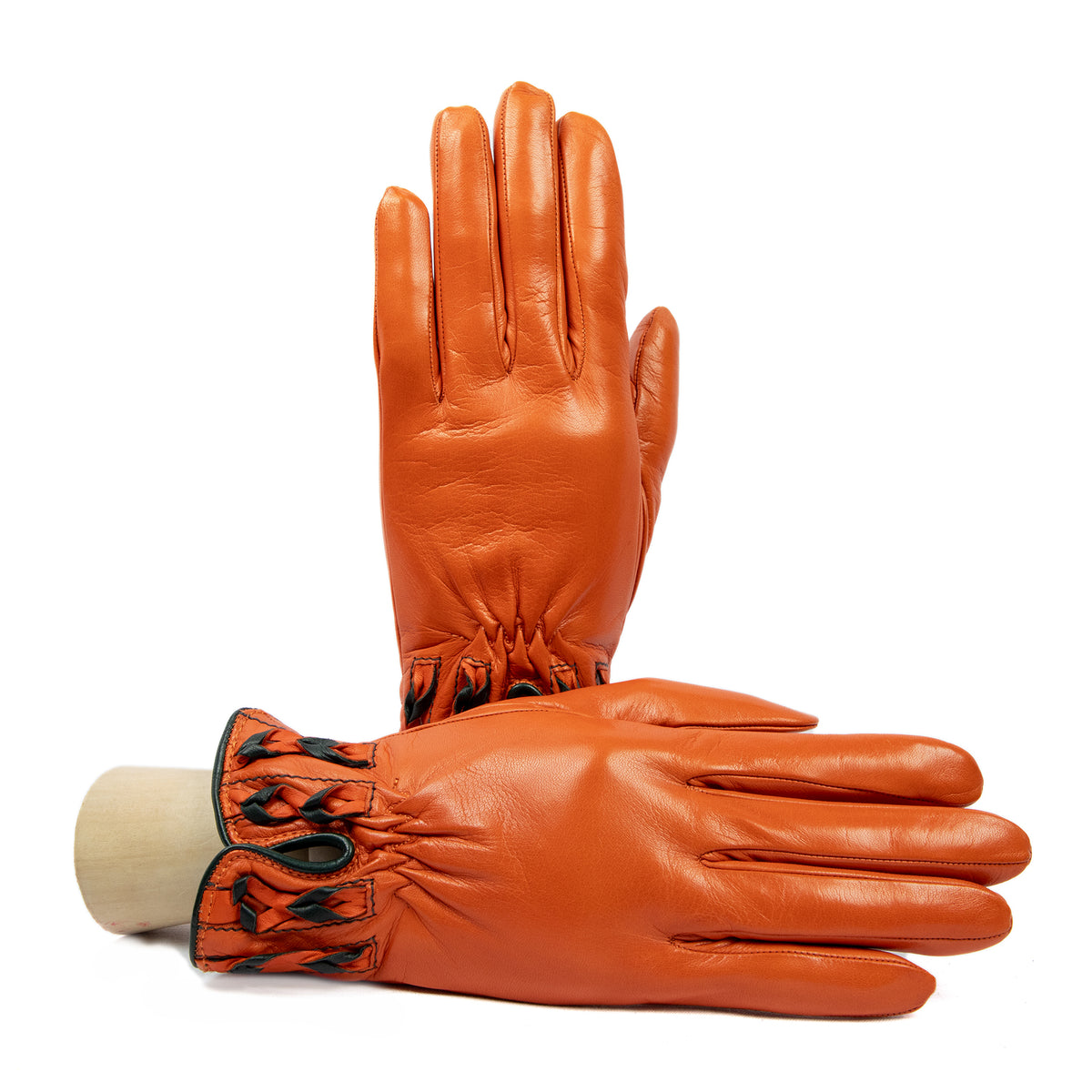 Woman's orange nappa leather gloves and bicolour braided cuff